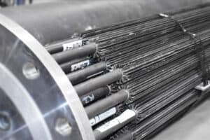 Enerquip shell and tube heat exchanger showing internal tube bundle design for industrial and sanitary applications.